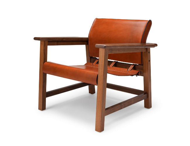 The Saddle Up Chair shown from the angled front with tan leather.