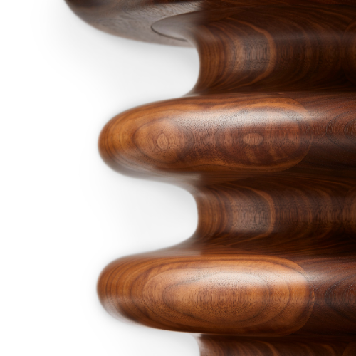 Close-up of a wooden table with rounded edges and a polished surface.