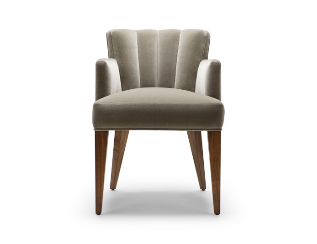 A beige upholstered armchair with wooden legs on a white background.