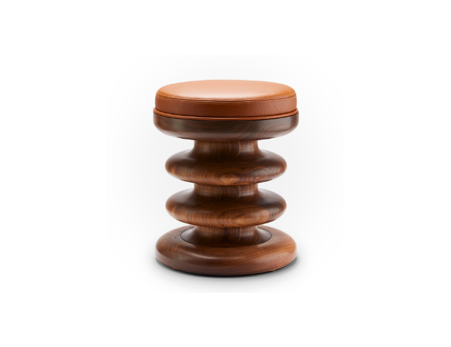 A wooden stool with a cushioned top, featuring a modern, sculptural design.