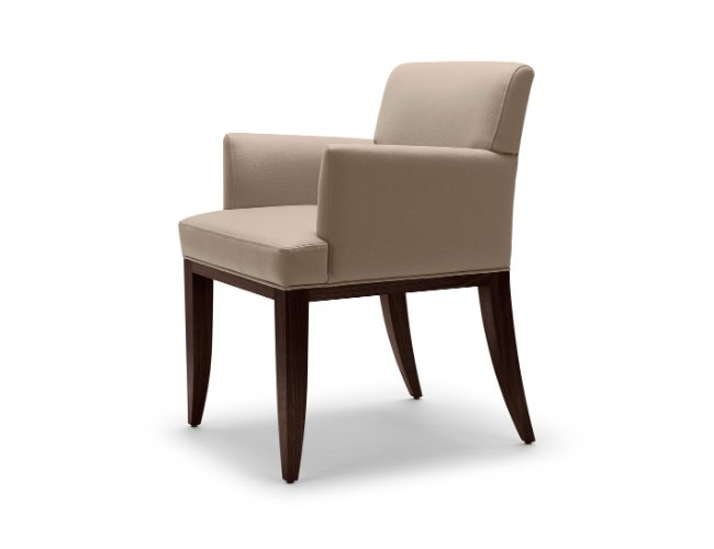 Beige upholstered armchair with dark wooden legs against a white background.