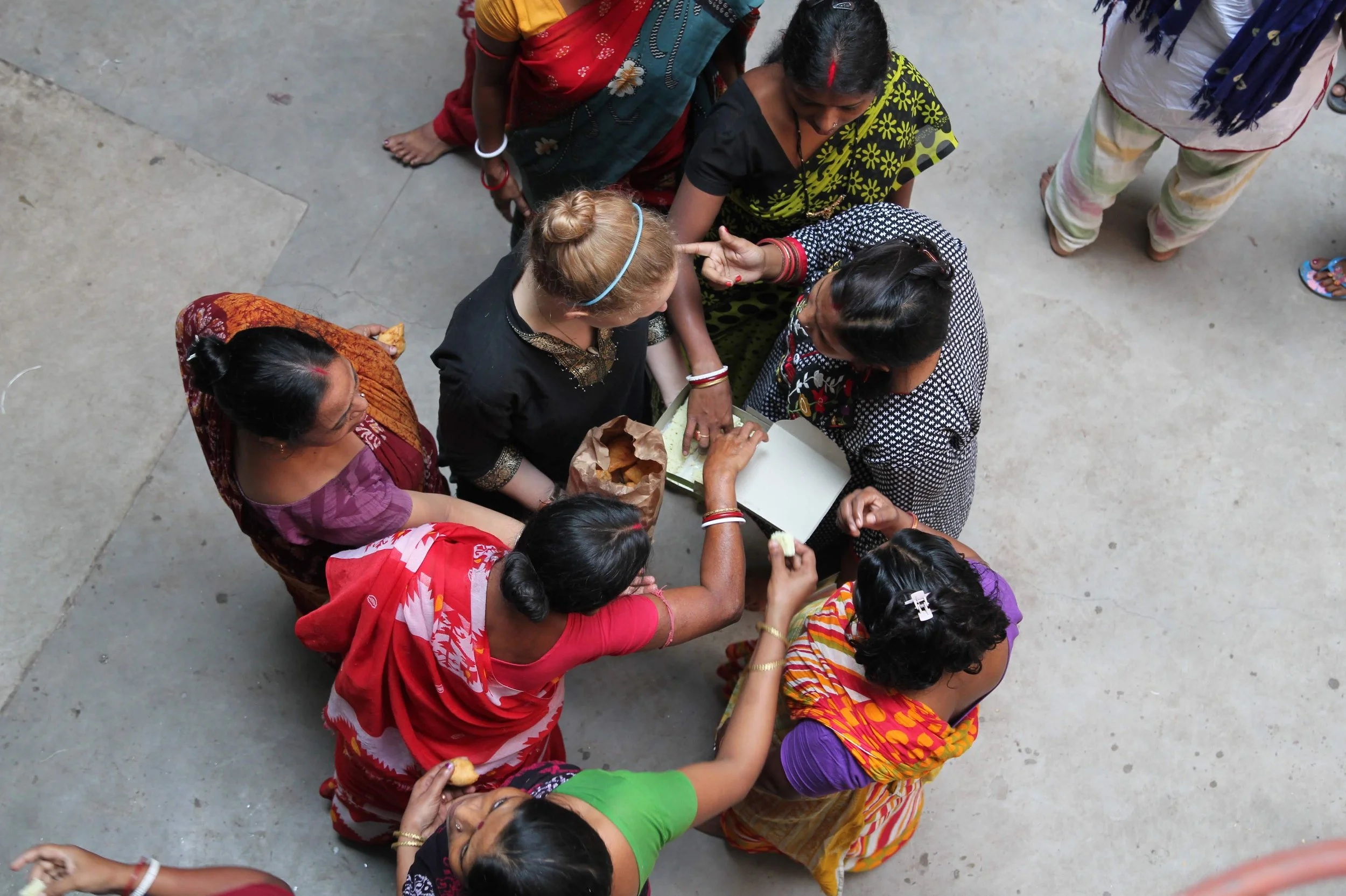 Ellie Walker-Todd with craftswomen in India