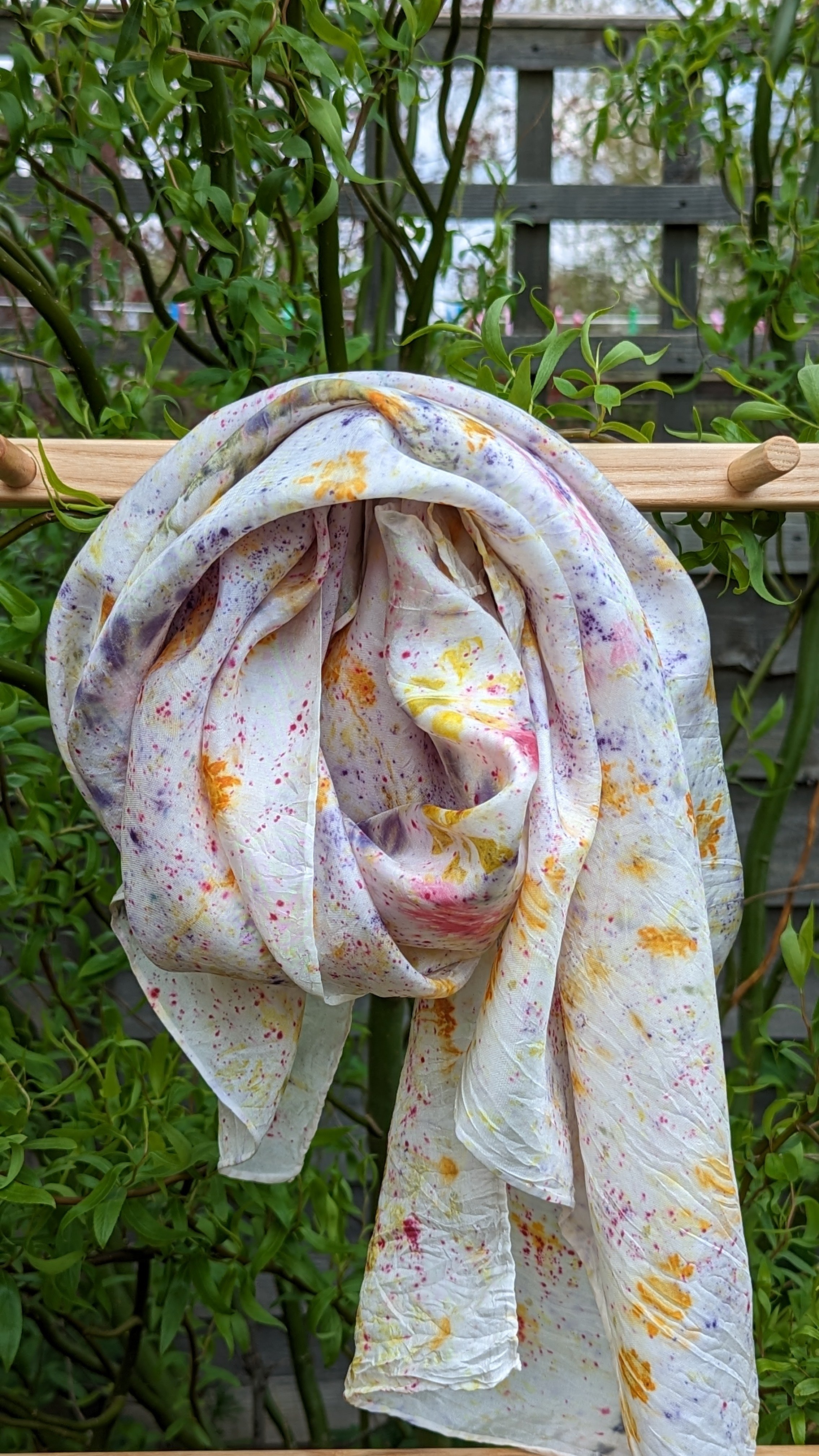 Steamed flower silk scarf looped on display ladder.jpg