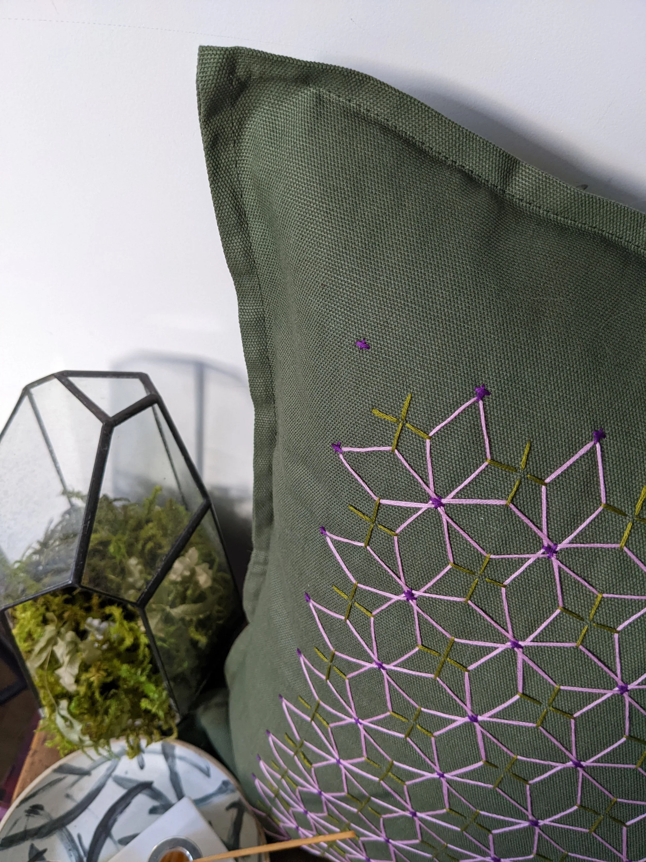 Earth green sashiko cushion closeup.jpg