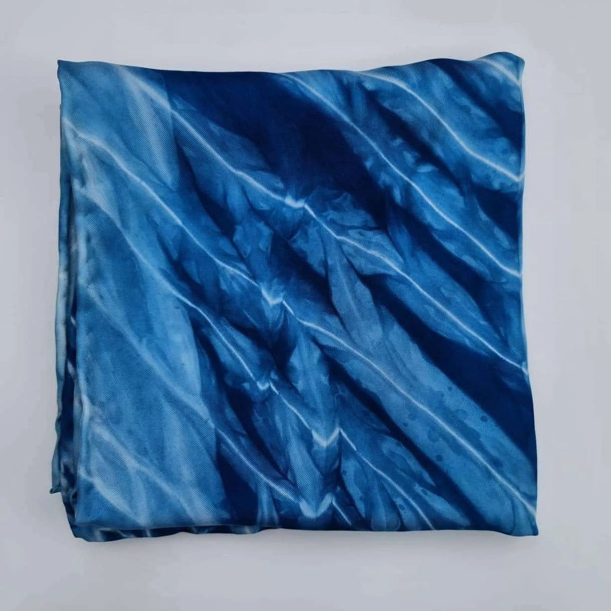 Lined indigo scarf folded.jpg