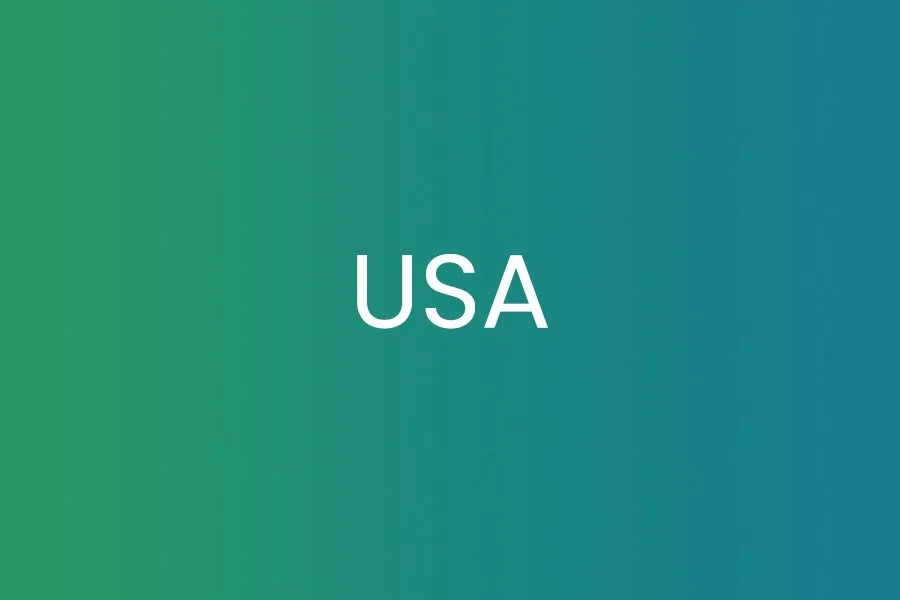 A digital graphic with a gradient background from green to blue, displaying the text 'USA' in white capital letters in the center.