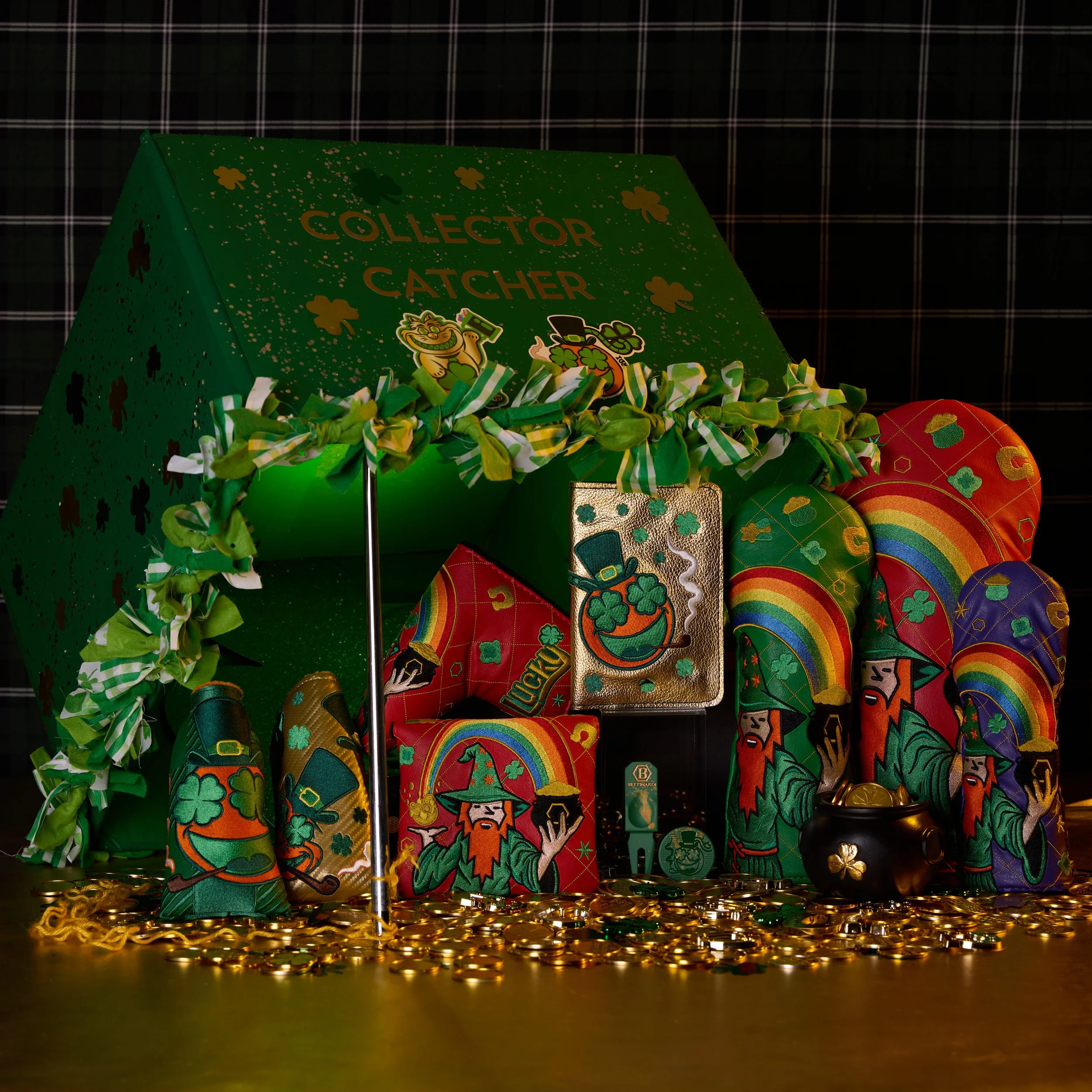 A display of St. Patrick's Day themed items, including a green box with the words 'Collector Catcher,' decorated with shamrocks, surrounded by colorful coins and festive decorations.