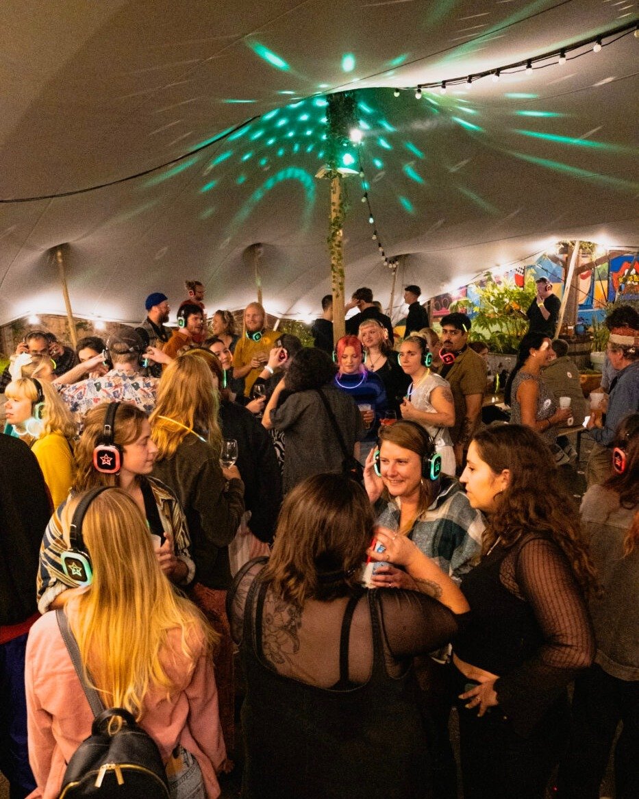Back to our regularly scheduled boogie! 🪩

Our Silent Disco is back every third Friday from June to October, bringing two channels, two different genres and a new music theme each month to the Tobacco Factory stretch tent.

Pick your channel, find y