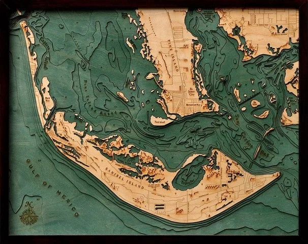 Laser-cut map of Sanibel Island, Florida, showing detailed waterways and land areas.