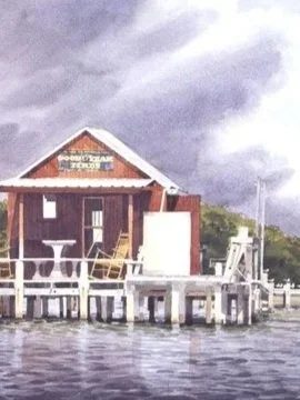 A wooden house on stilts over water with a boat docked nearby, under stormy skies.