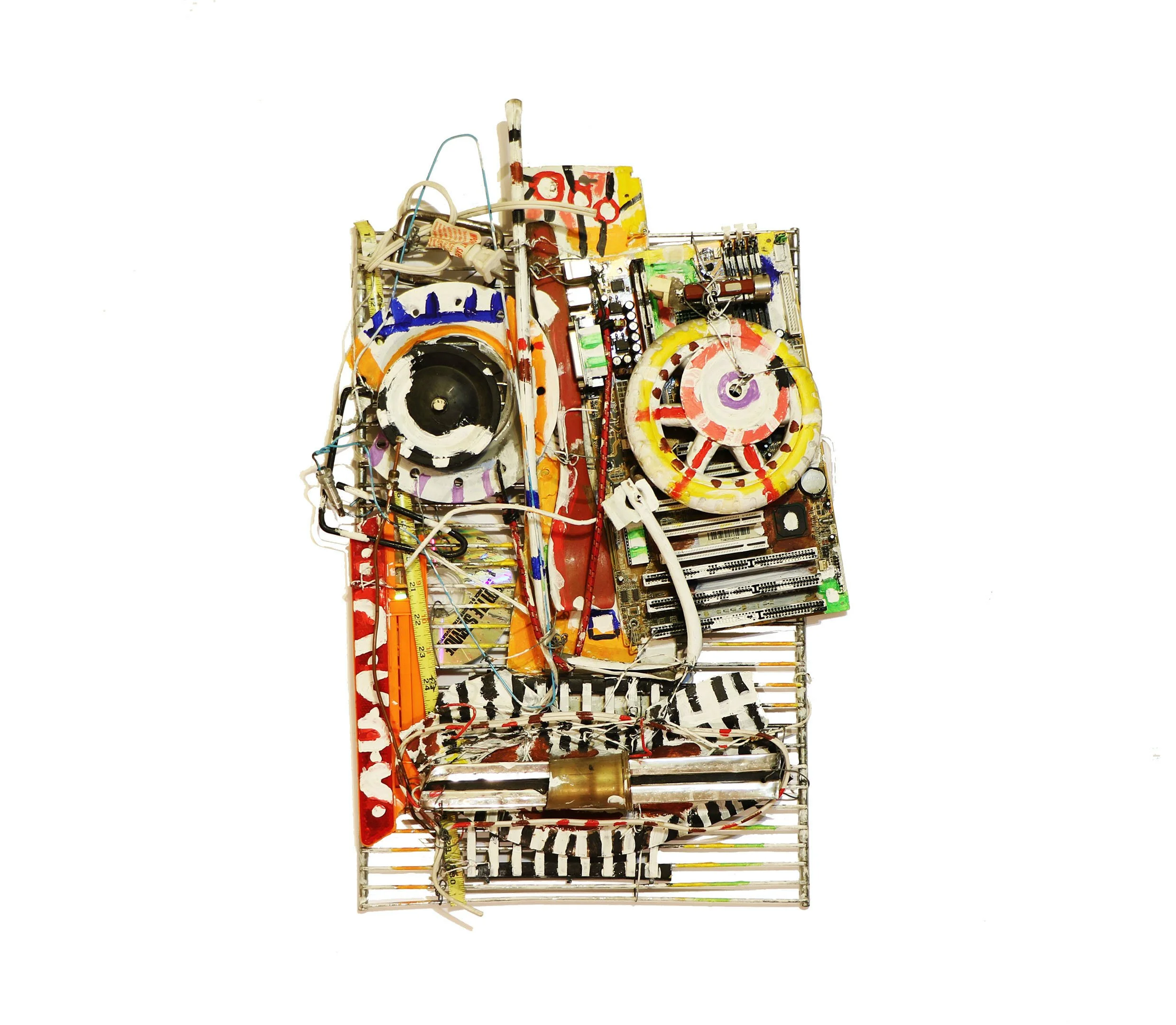 Found object sculpture by Karl A. McIntosh featuring salvaged electronic components, circuit boards, wires, and colorful recycled materials assembled into an abstract mixed media composition.