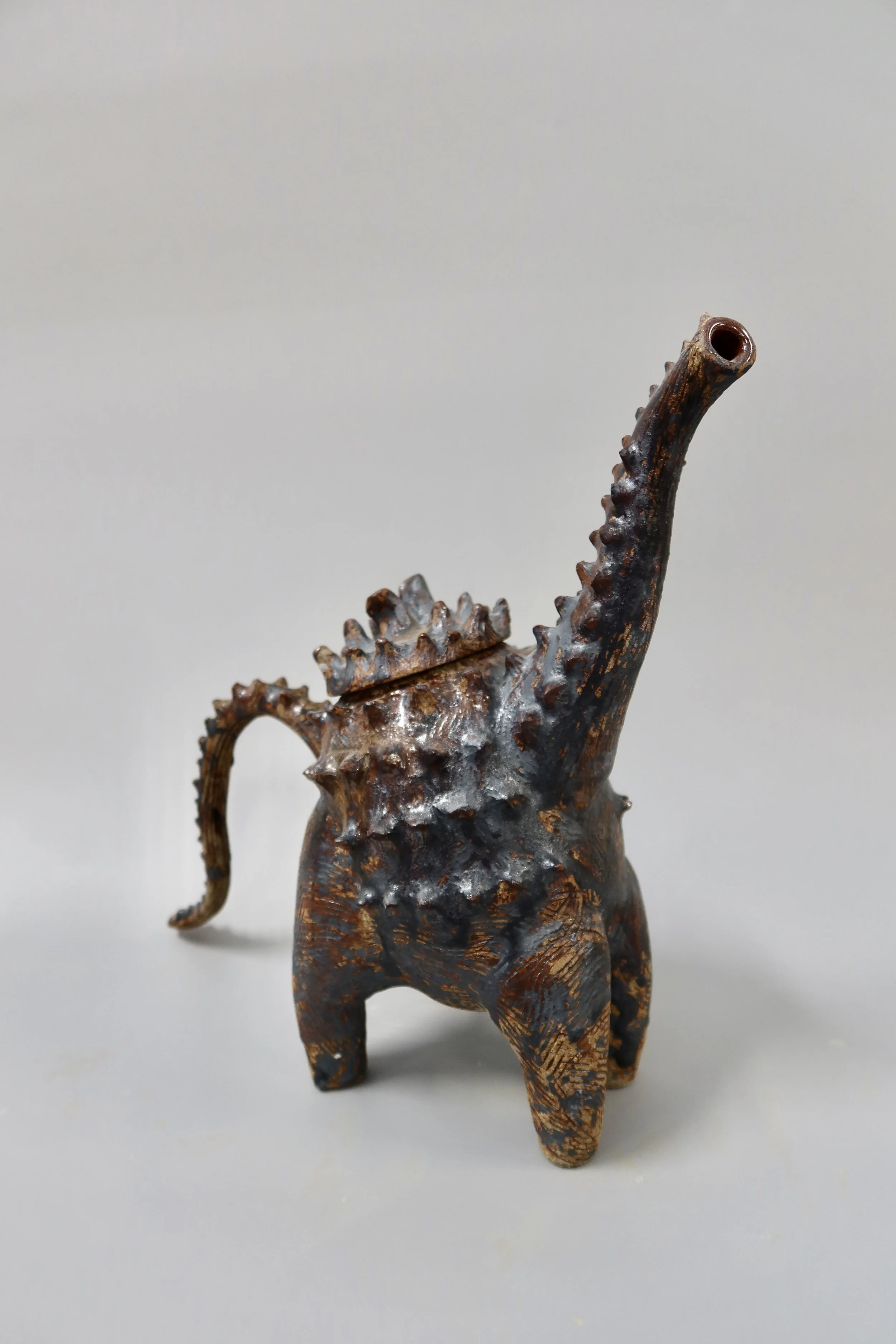Dinosaur Teapot — Stoneware, 2025, 11″ H × 10″ W × 4½″ D
