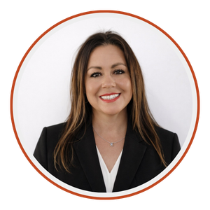 Marissa Gomez AltoRoc Partner wearing a black blazer and white shirt, smiling against a white background.
