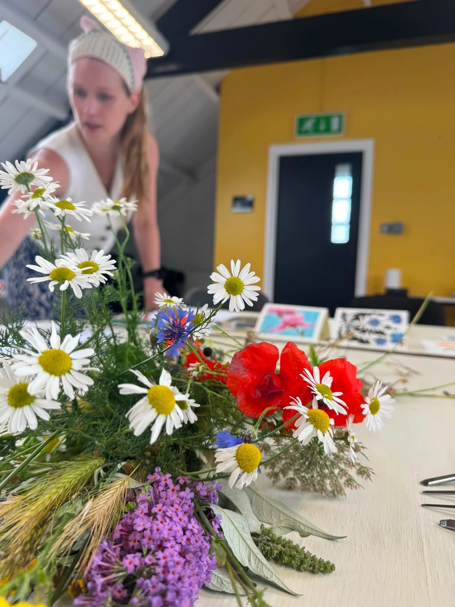 Louise, one of the artists running workshops at Woodmill ahead of a botanical themed lino workshop.