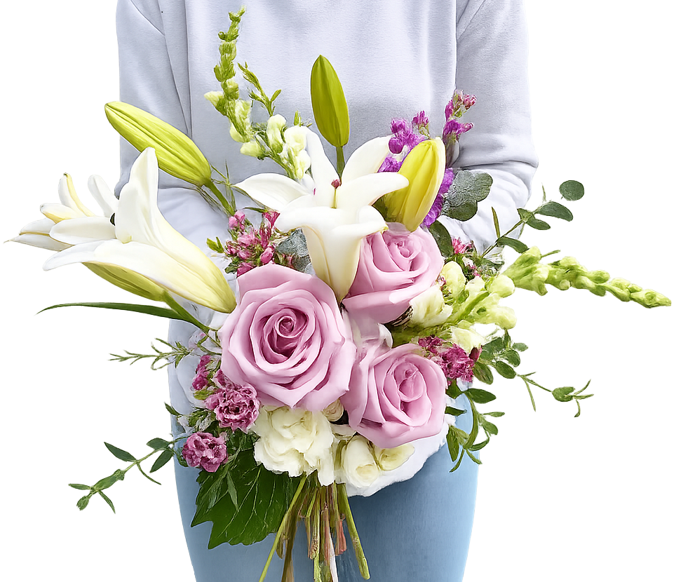 Person holding a bouquet of pink roses, white lilies, and assorted greenery.