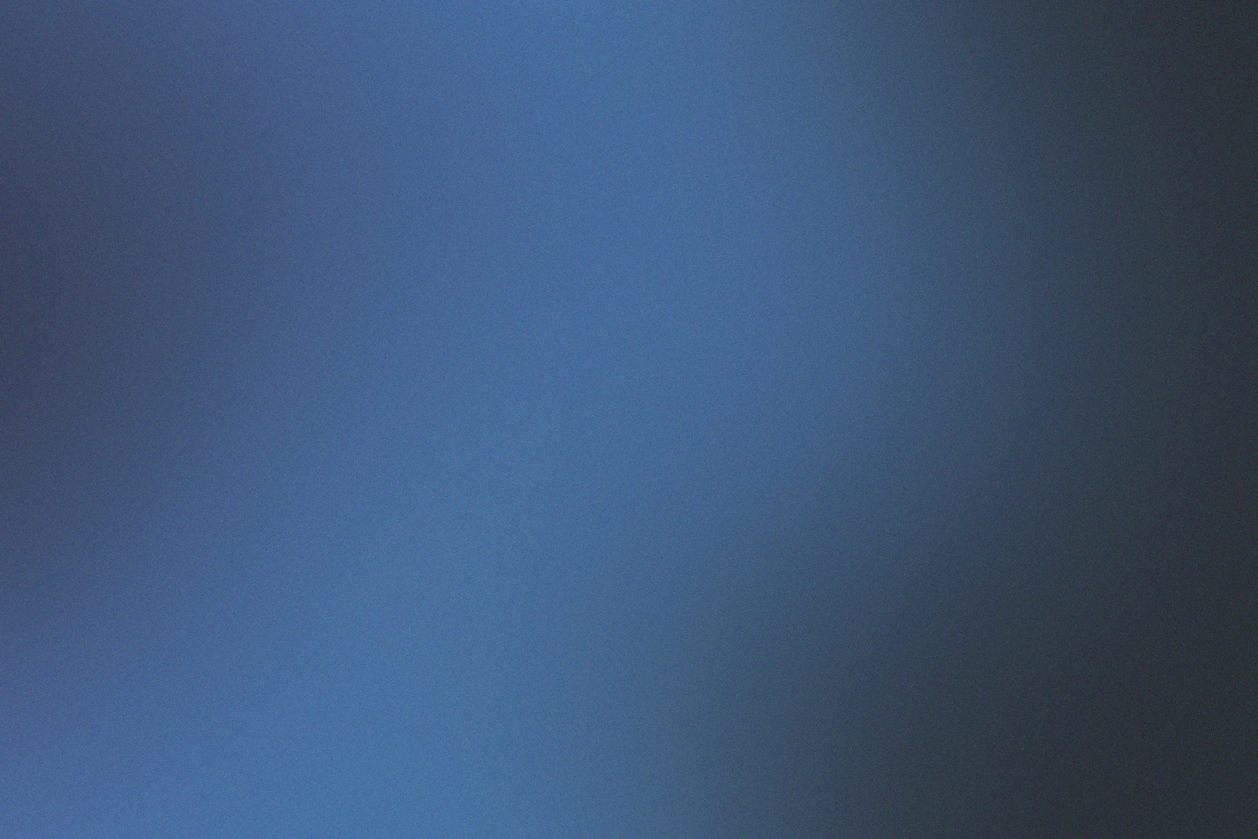 A clear blue sky during daytime.