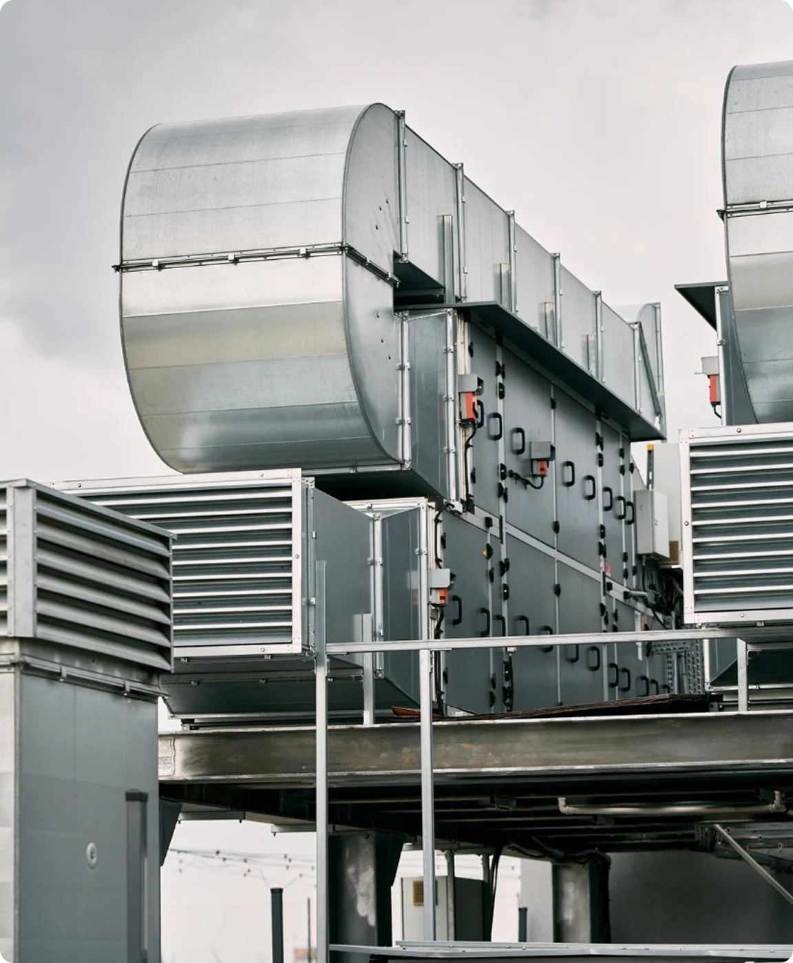 Industrial rooftop HVAC units and ventilation equipment.
