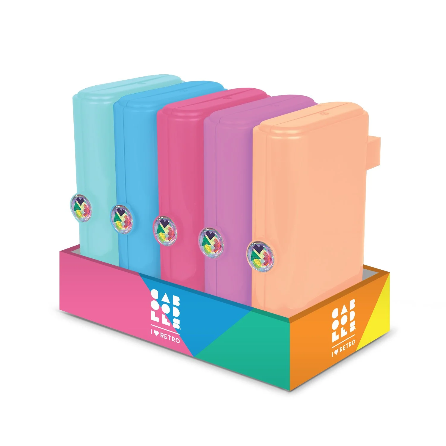 Set of pastel colored staplers in pink, blue, purple, peach, and light blue, displayed in a colorful retail box labeled 'I Love Retro' with a rainbow-colored design and a logo.