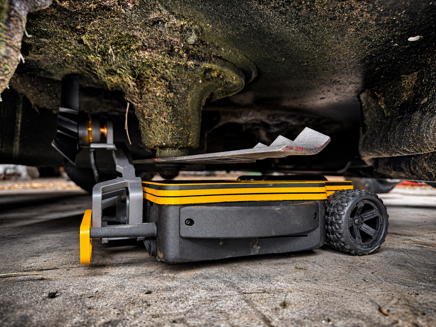 Gritty Robotic Mower Undercarriage Close-Up.png
