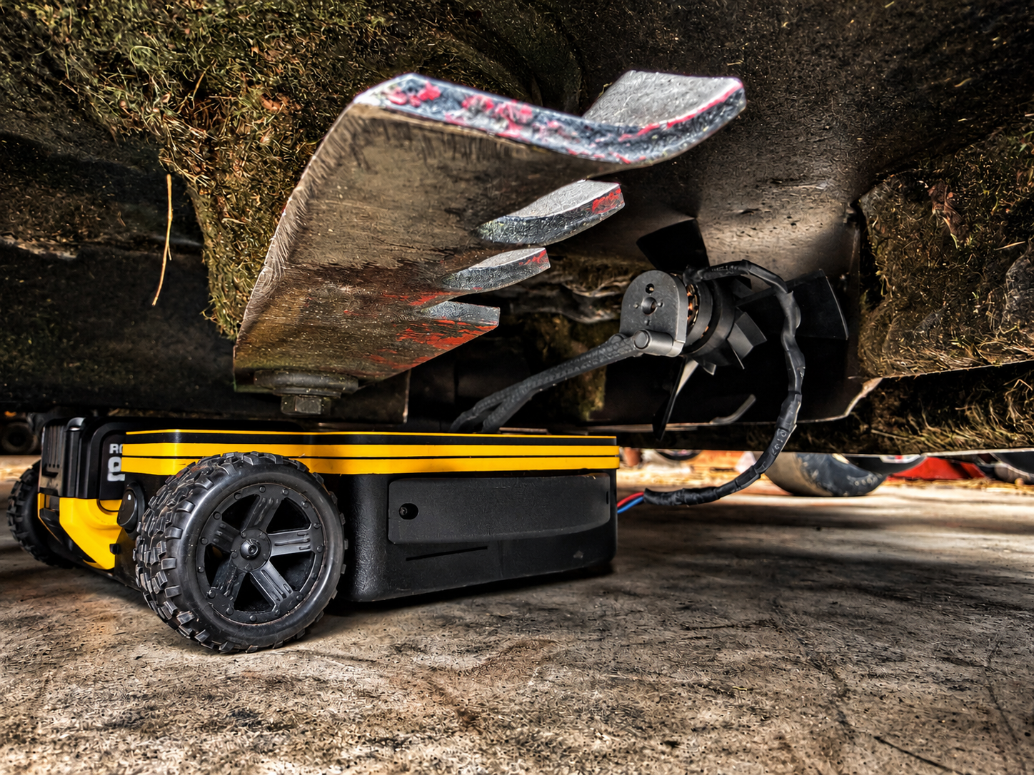 Robotic Mower Beneath Gritty Deck.png