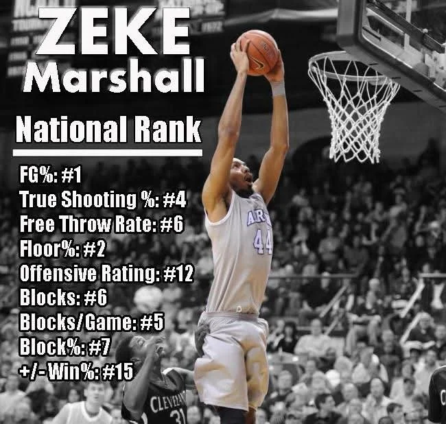 A basketball player named Zeke Marshall wearing jersey number 44 jumping towards the hoop for a dunk on the basketball court.