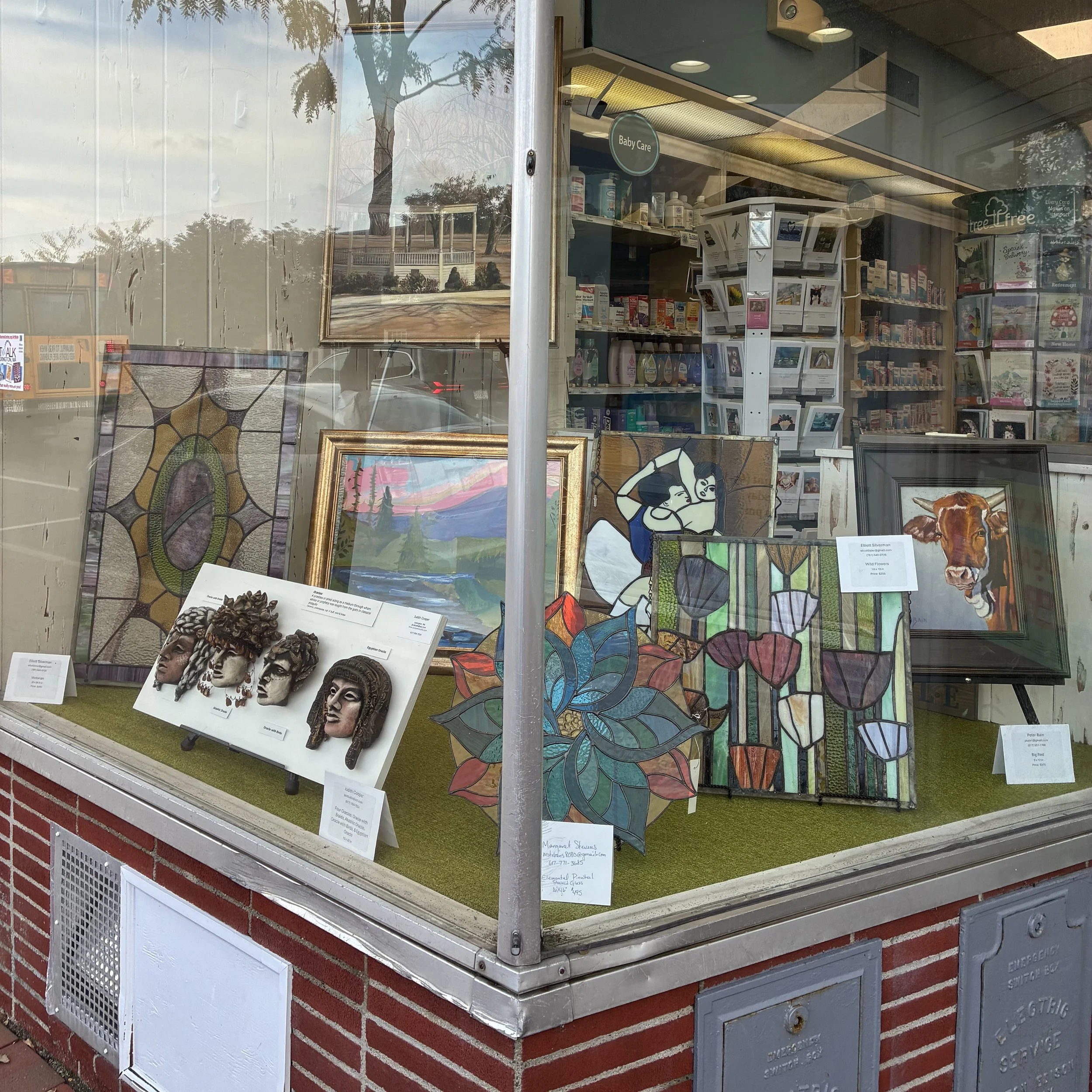 image of window with art such as stained glass, painting, and ceramics