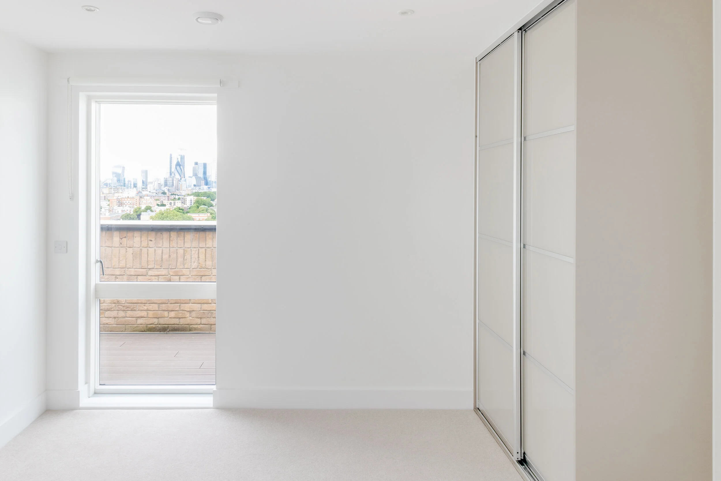 1202 - Bedroom with City Views.jpg