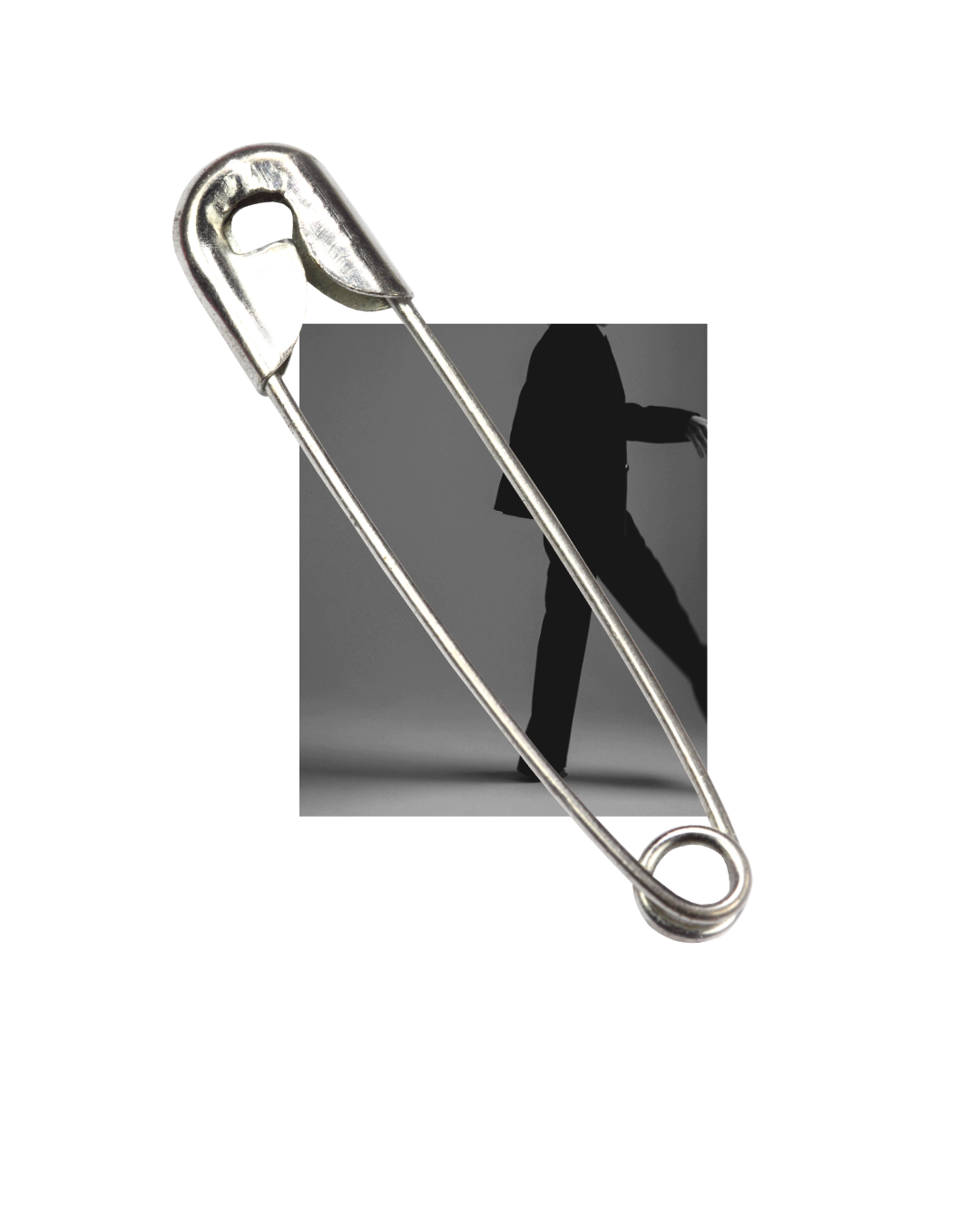 A safety pin with a shadow of a walking person reflected on a gray background.