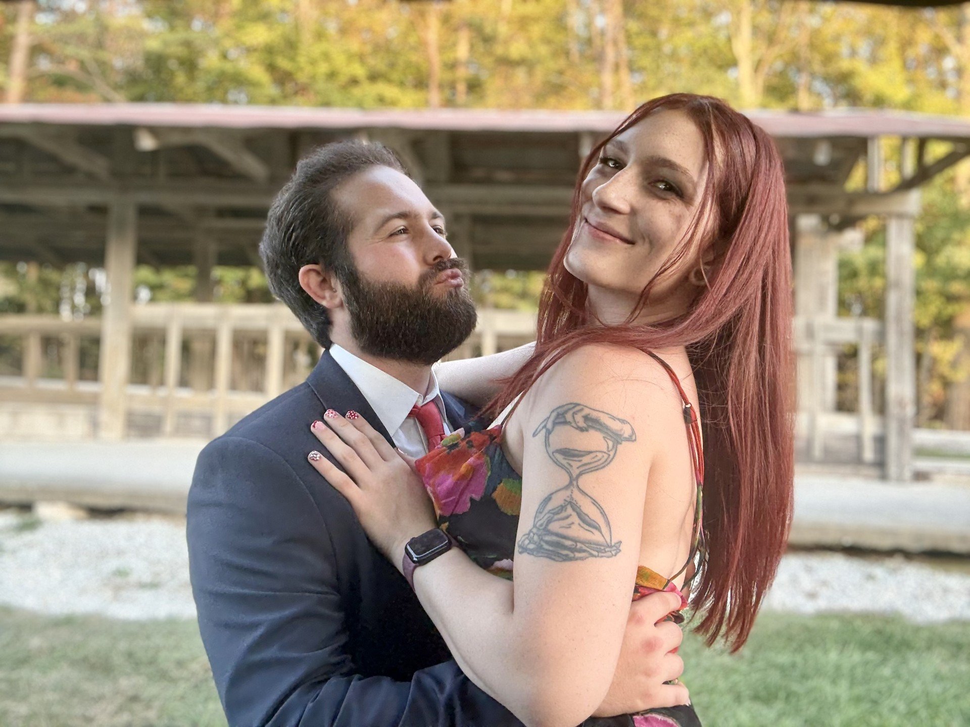 Myself and my fiancé taking pictures before a wedding ceremony.