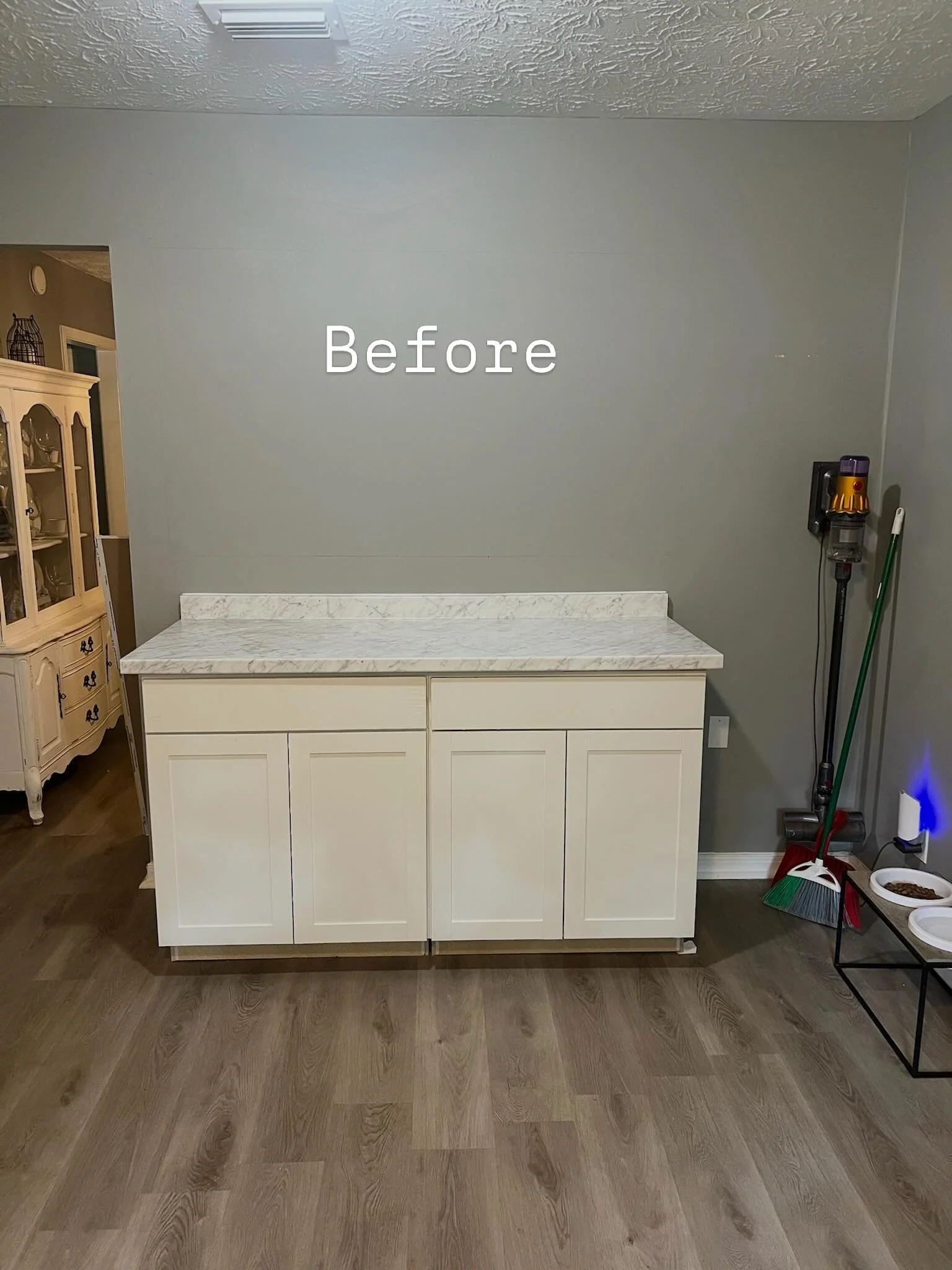 No pantry? No problem. 
This kitchen remodel was all about function meeting design. We created a custom pantry for much-needed storage and added a brand-new bar feature that completely changed the flow of the space. The bar is topped with warm butche