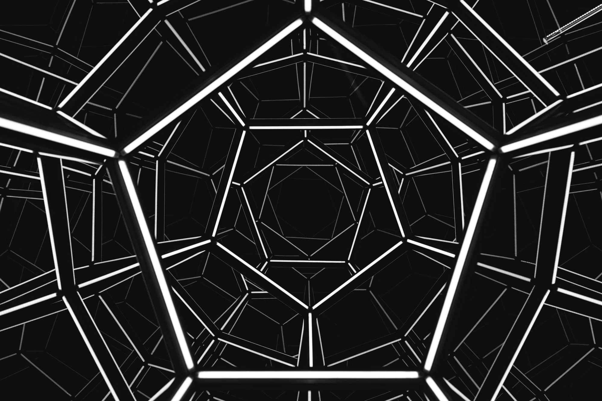 A geometric abstract with illuminated white lines forming a tunnel-like pattern on a black background.