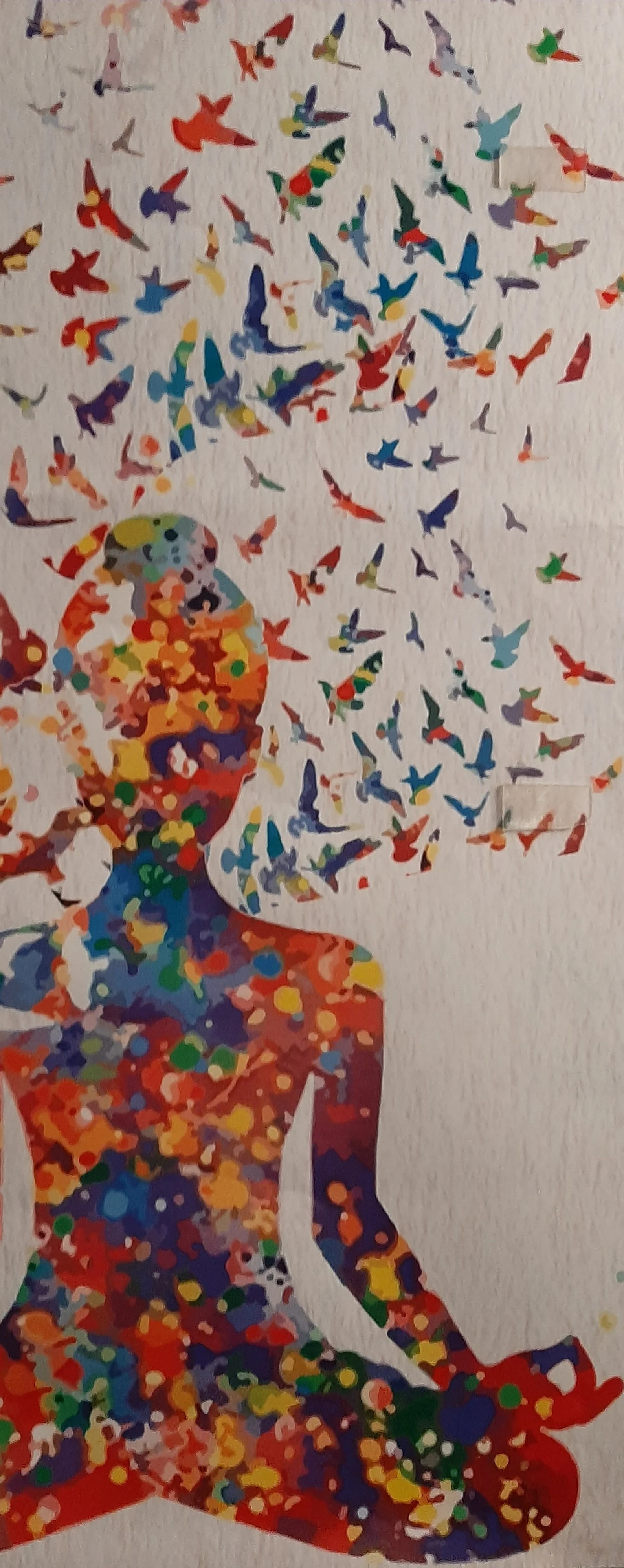 Colorful abstract artwork of a woman sitting with her arms crossed, composed of multicolored dots and splashes, with many small rainbow-colored birds flying out of her head.