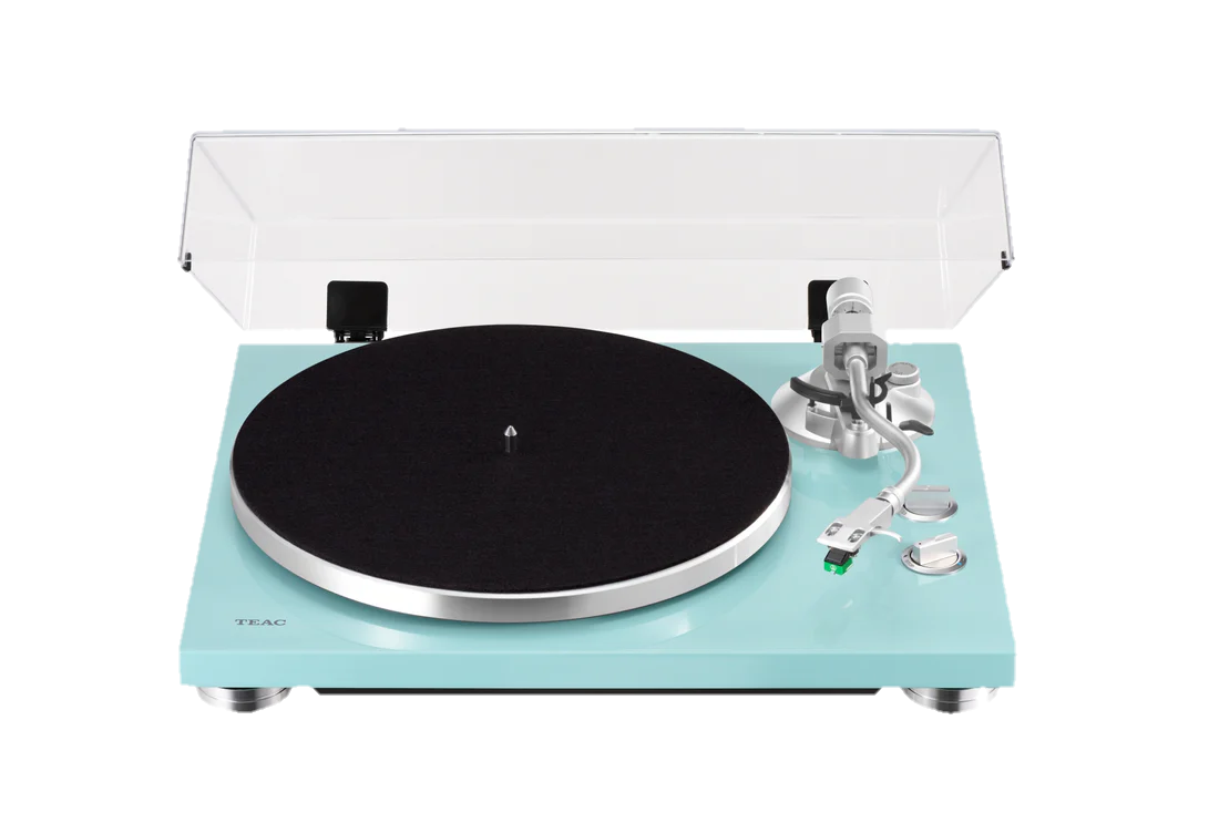 A teal-colored turntable with a black platter, tonearm, and a clear dust cover.