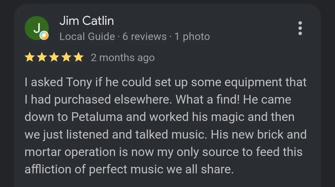 Screenshot of a Google review by Jim Catlin with five stars, mentioning his experience with Tony setting up equipment and talking about music.