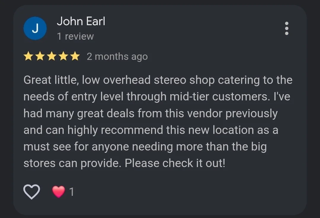 Customer review of a stereo shop with five stars, posted two months ago, expressing satisfaction with low overhead and good deals, recommending the new location.