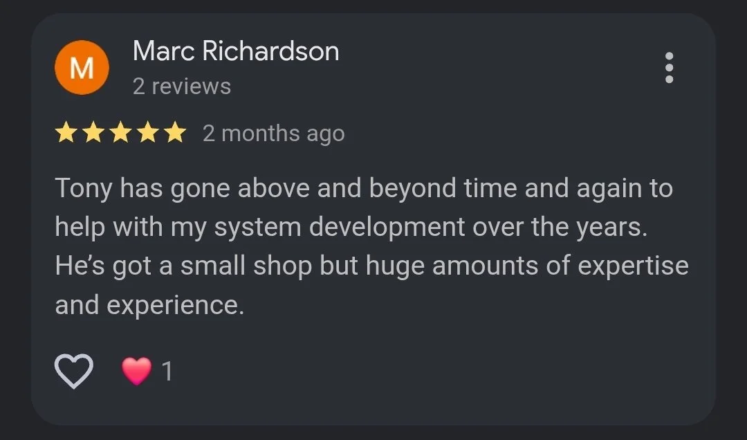 Screenshot of a Google review by Marc Richardson praising Tony for his expertise in system development.