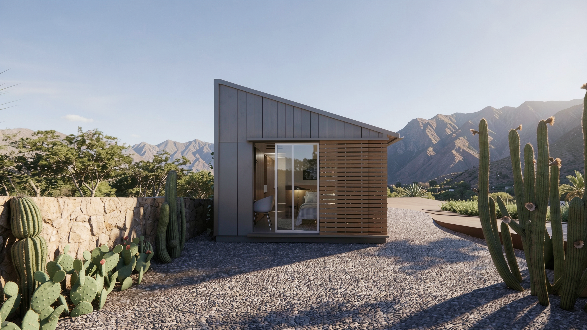 Segunda residencia compacta y prefabricada, con un amplio ventanal que conecta con el jardín, la fachada es de paneles de concreto prefabricados, ubicada en un entorno natural en San Miguel de Allende, Mexico