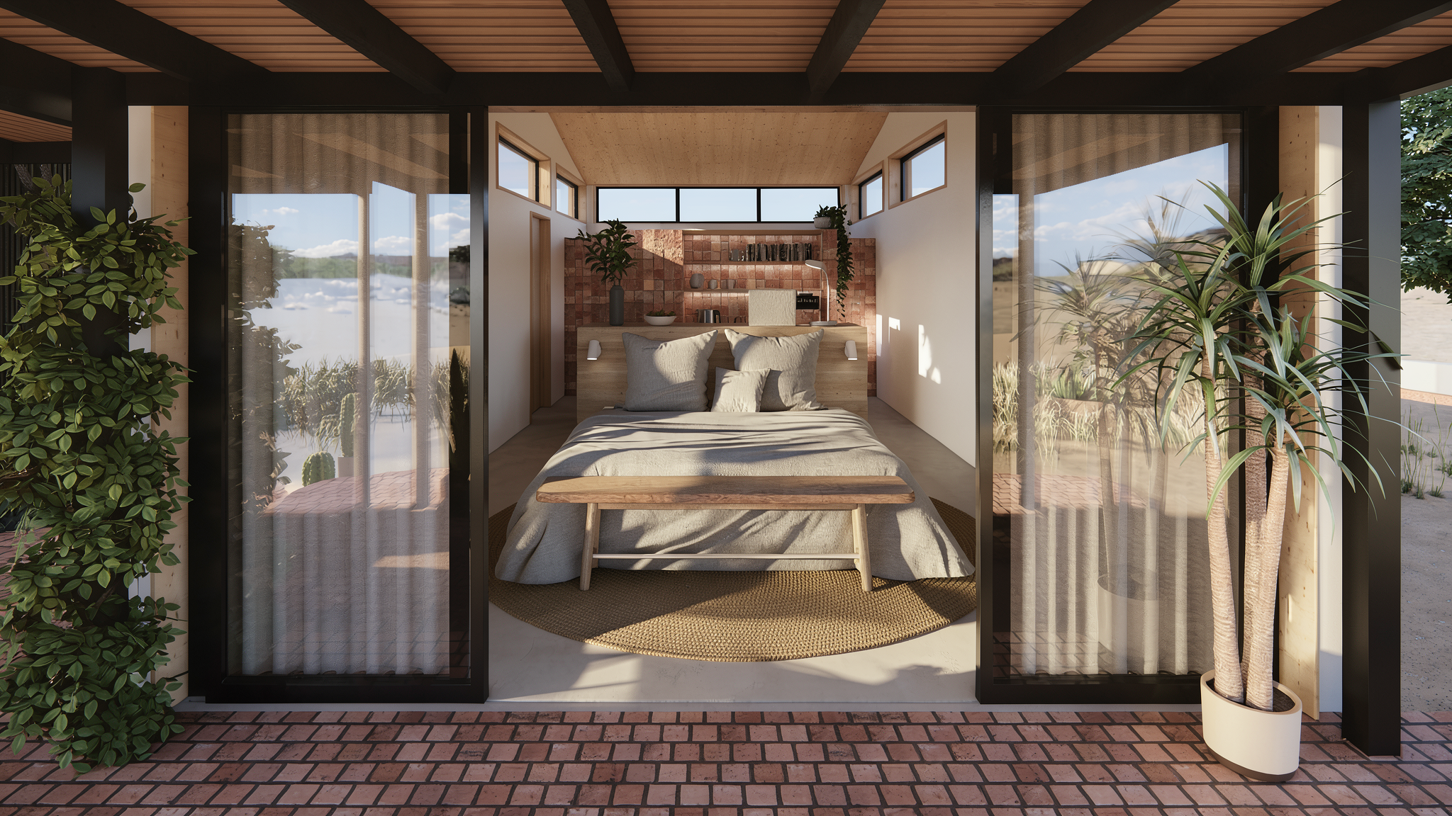 Vista desde la terraza de un dormitorio moderno con paredes blancas, ventanas grandes y vistas al exterior, decorado con plantas y muebles de madera, en un entorno natural y soleado.