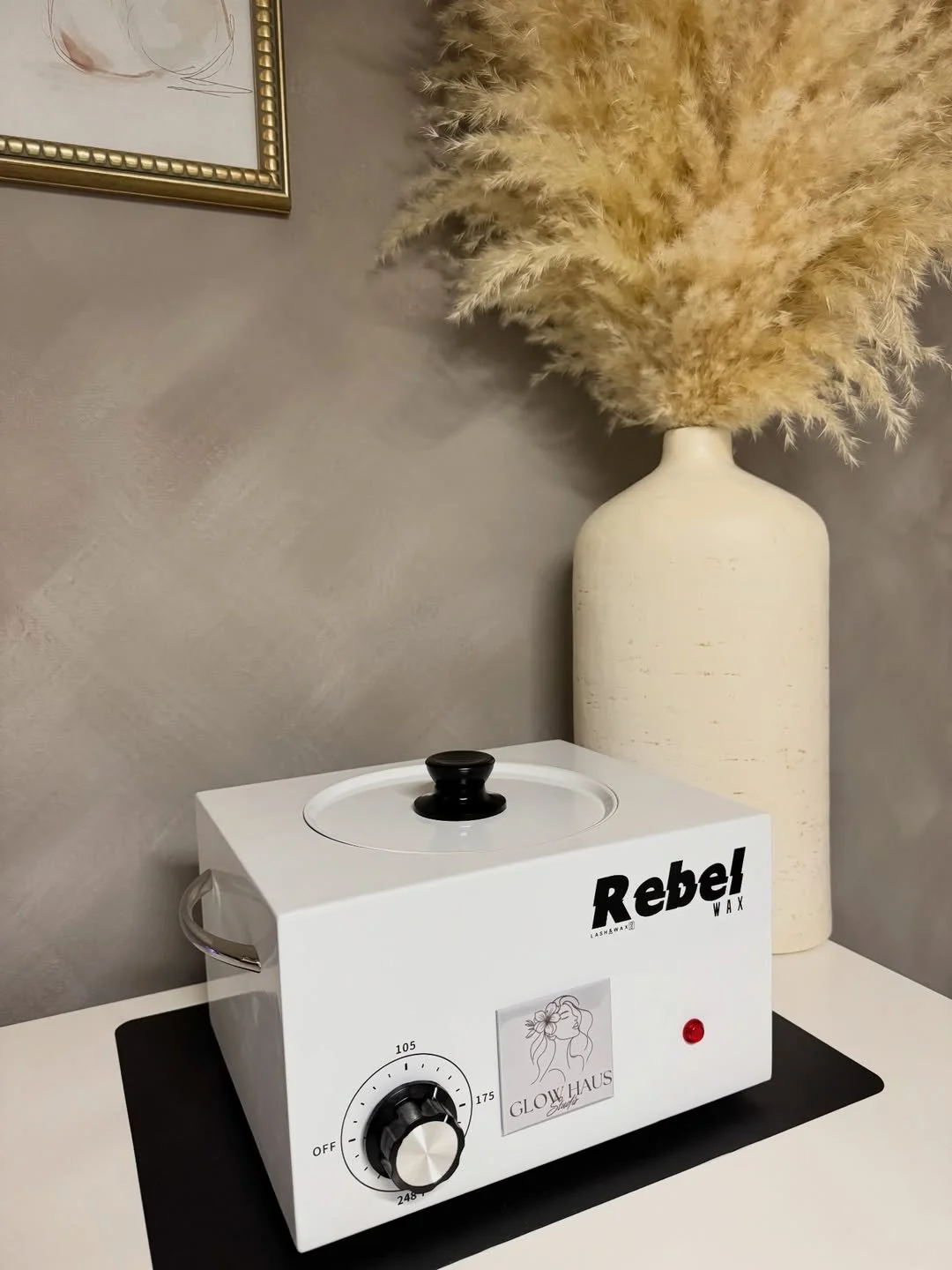 Professional hard wax warmer ready for esthetician waxing treatments in a clean beauty studio