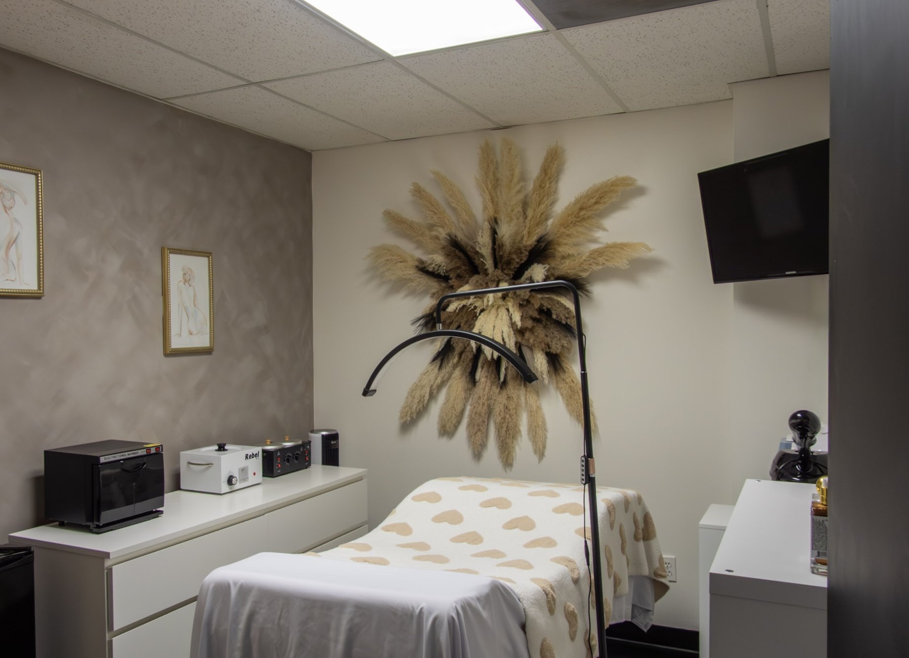 Clean and relaxing esthetics treatment room prepared for professional skincare services