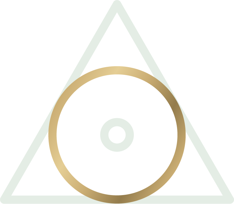 A gold-colored ring with a square hole in the center, placed on a plain light-colored background.