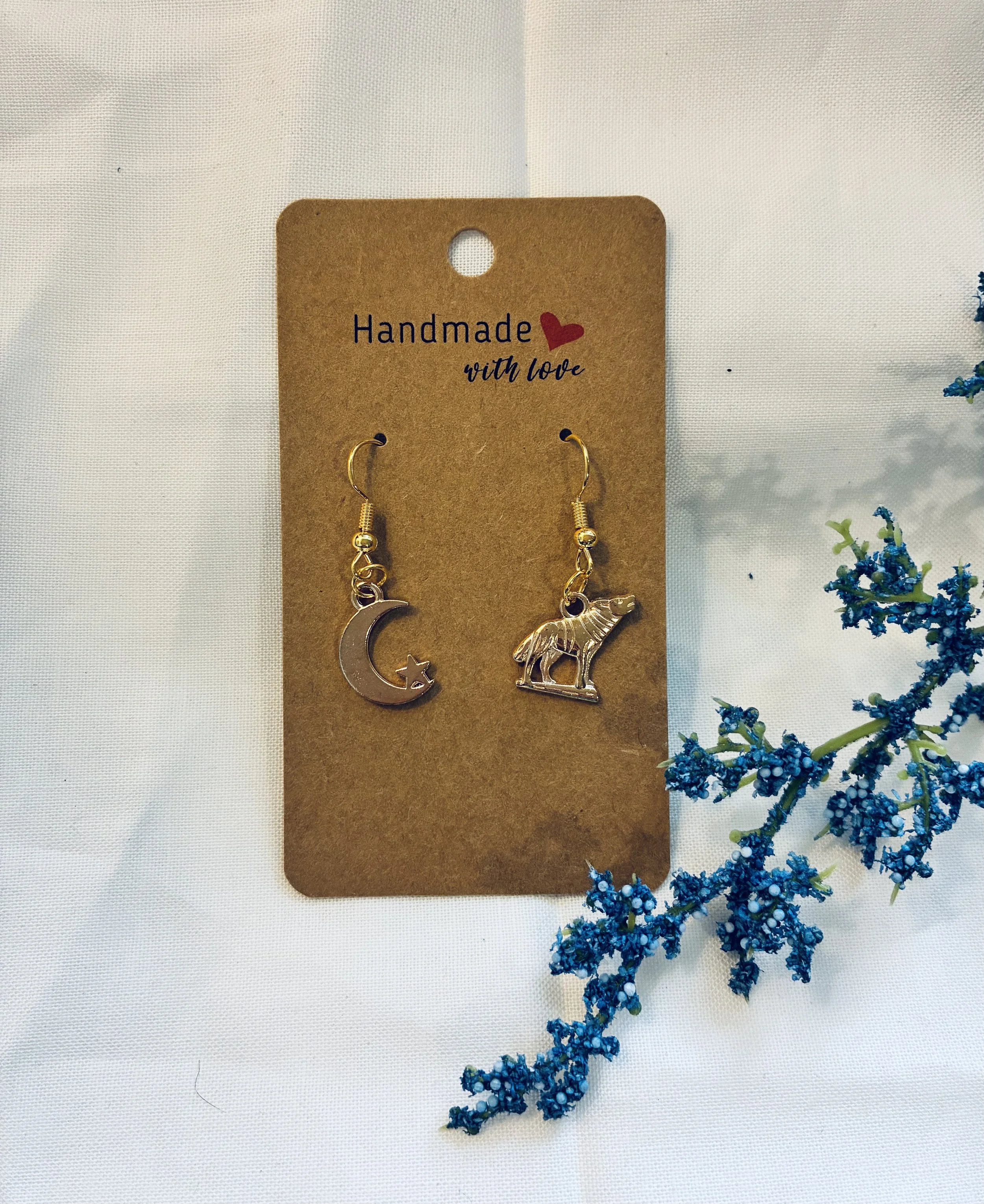 Howling Wolf & Moon mismatched earrings
