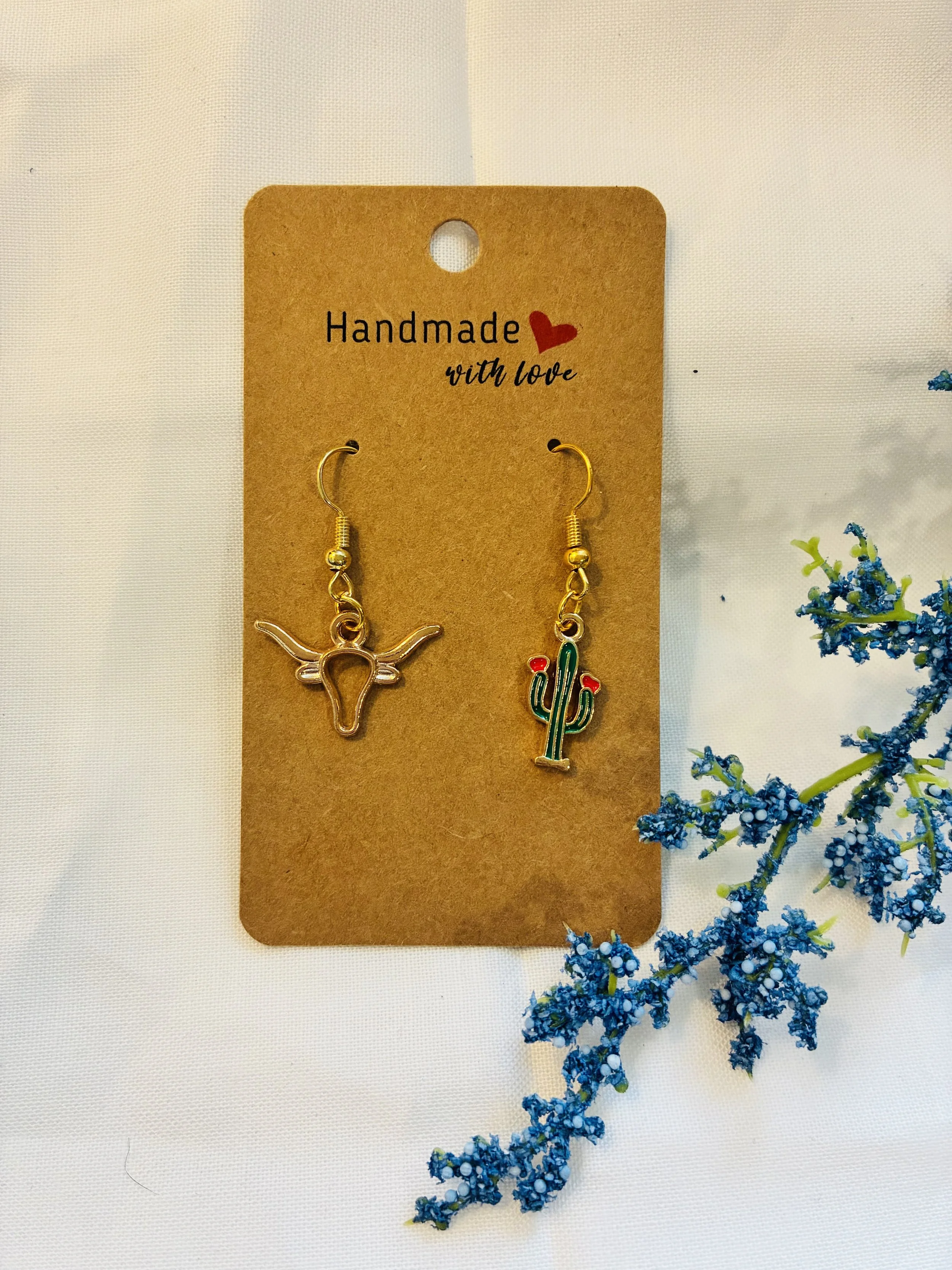Longhorn & Cactus mismatched earrings