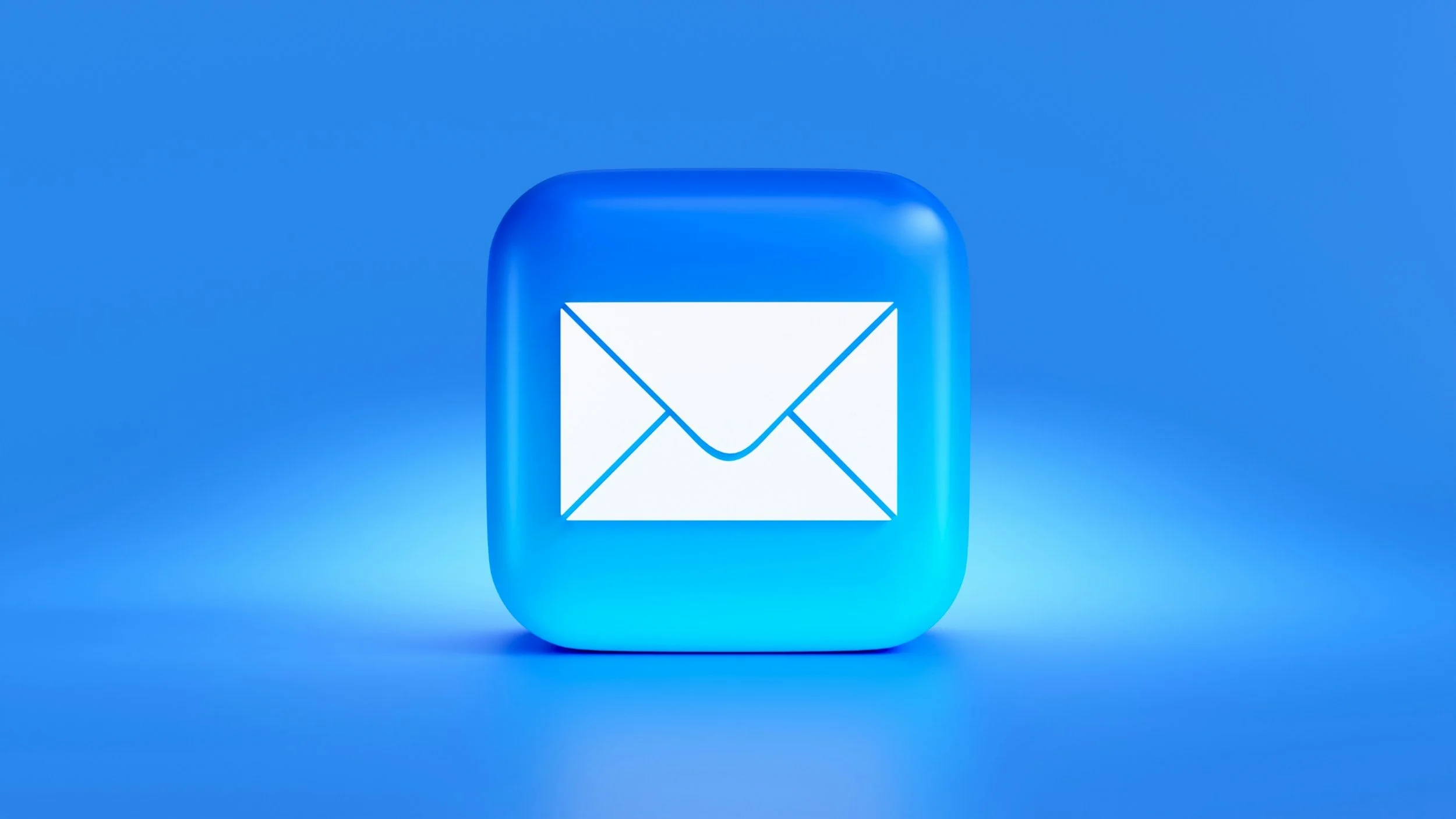 A white digital icon of an envelope on a blue rounded square background, representing email or messaging.