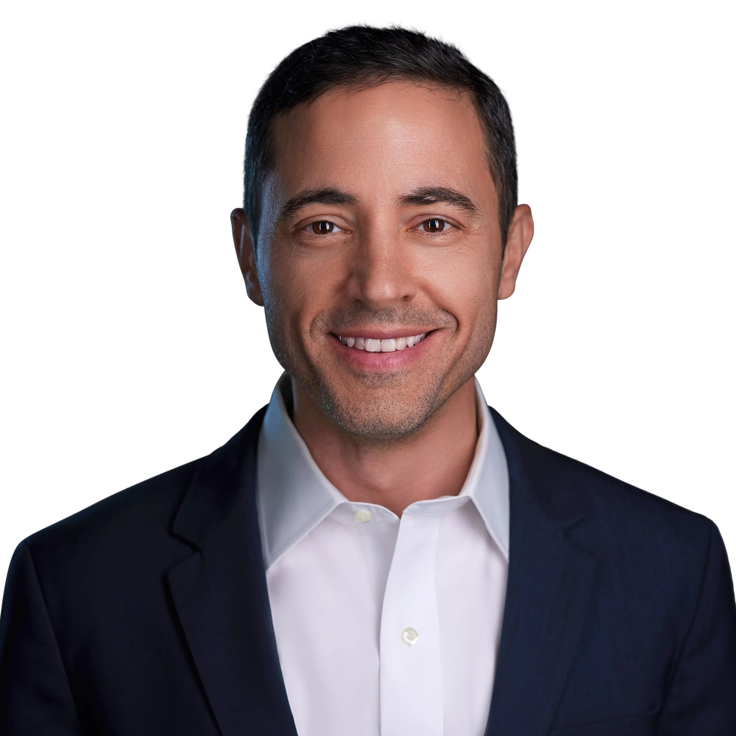 Headshot of a man in Scottsdale, showing from the forehead to just below the chin, wearing a black suit and white shirt against a plain white background.