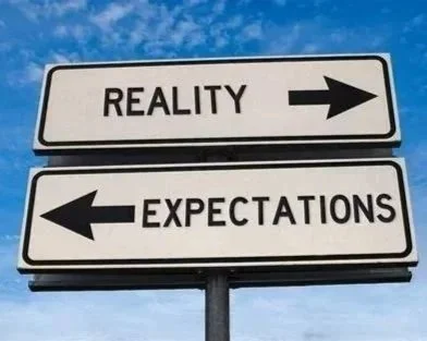 reality%252Bexpectation%252Broad%252Bsign.jpg