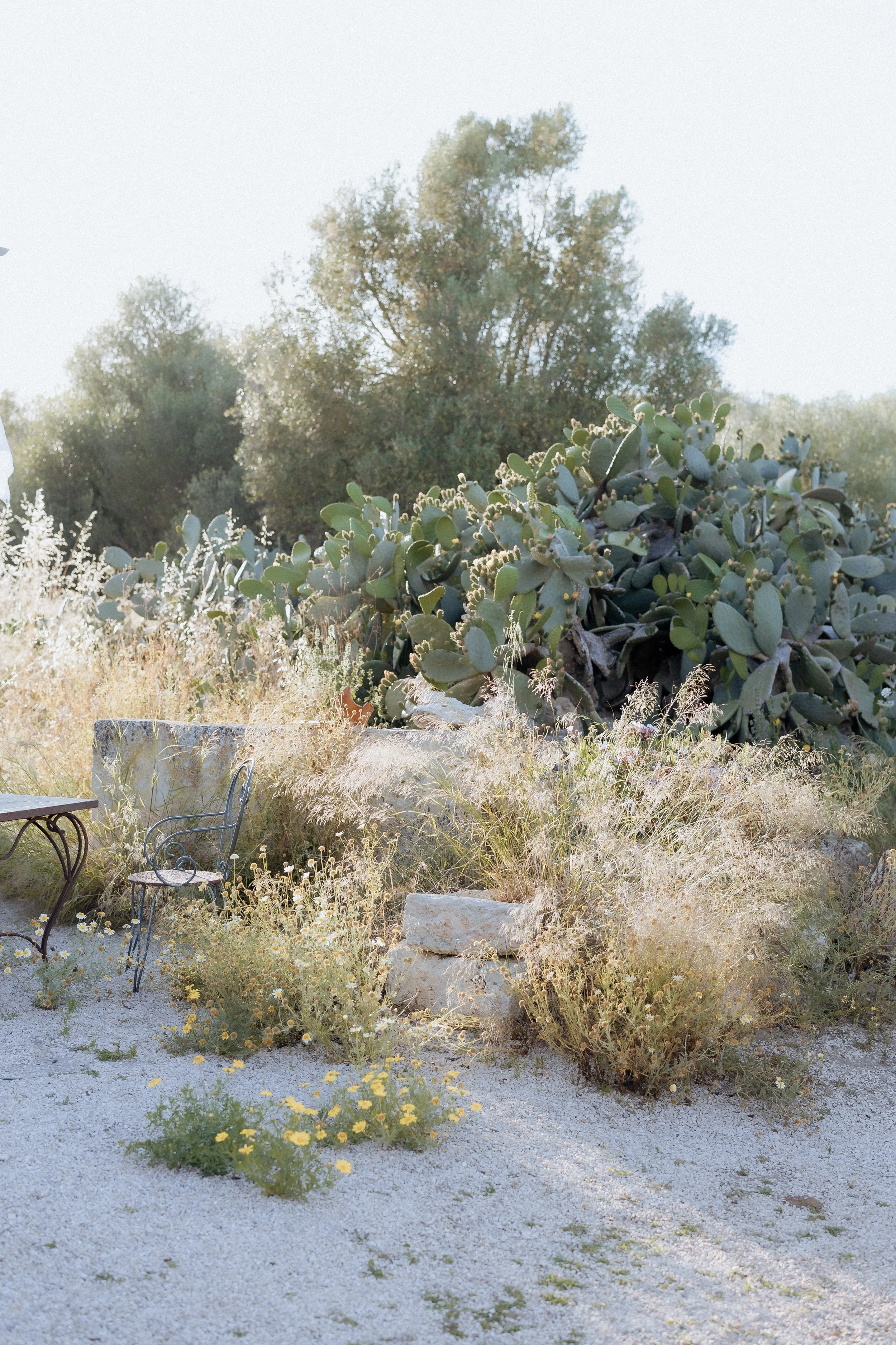 Contemporary artist Denize Jung creating layered abstract artwork in her Mallorca studio inspired by slow Mediterranean living.