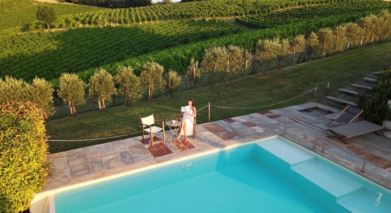 Buga Retreats vineyard swimming pool lounge.