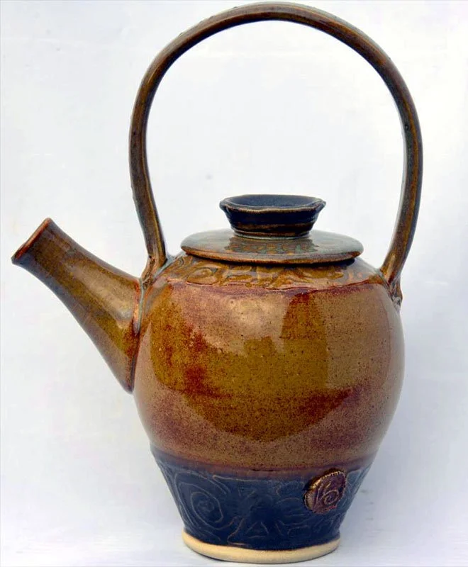Karen Clark-klaycentric studio teapot.jpeg