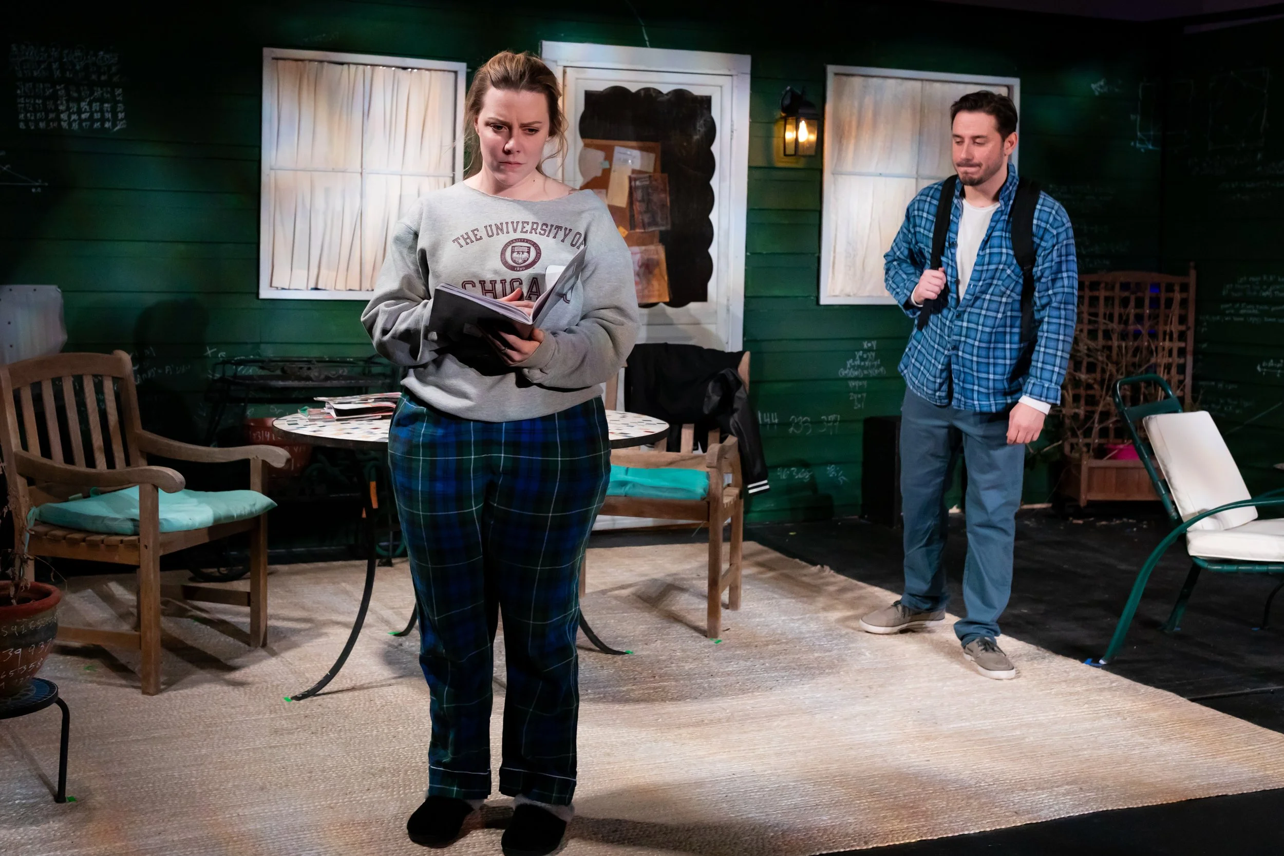 Hal and Catherine discussing math onstage in the play “Proof” by David Auburn